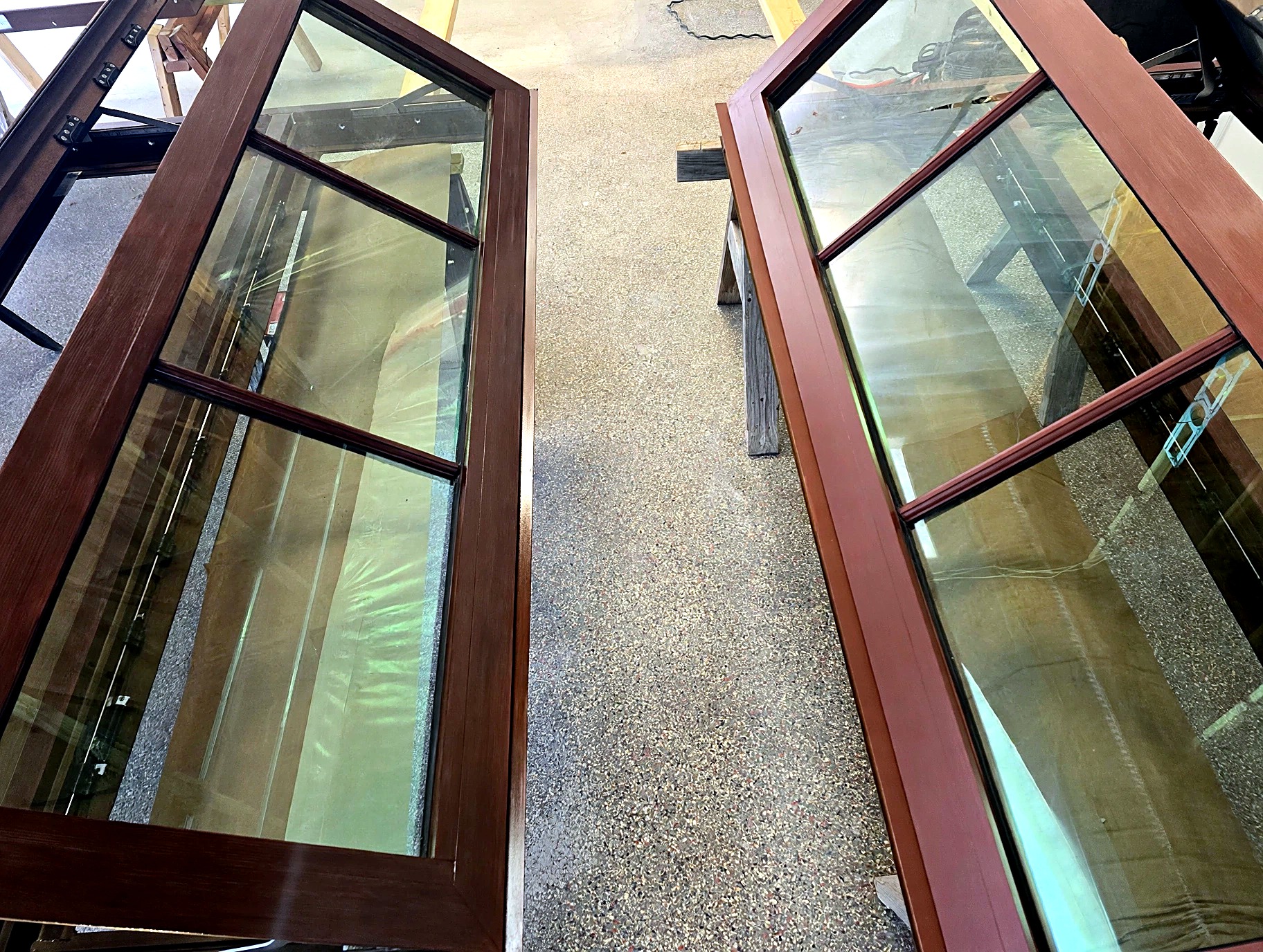 Window frames completed with a hand-painted faux wood grain finish