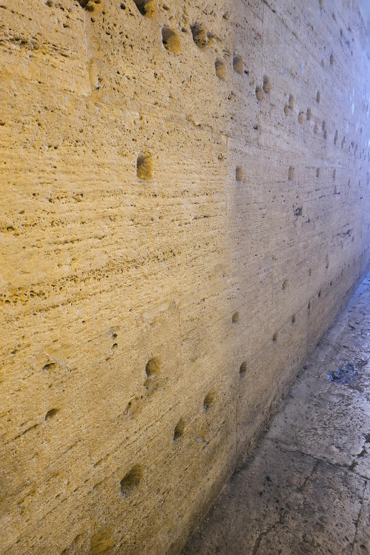 Detailed view of the handcrafted travertine texture